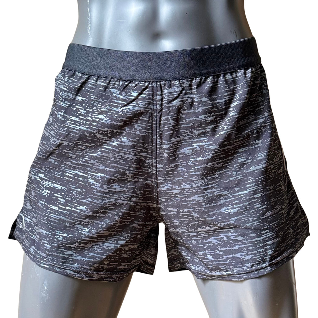 Short reflejante corto dama