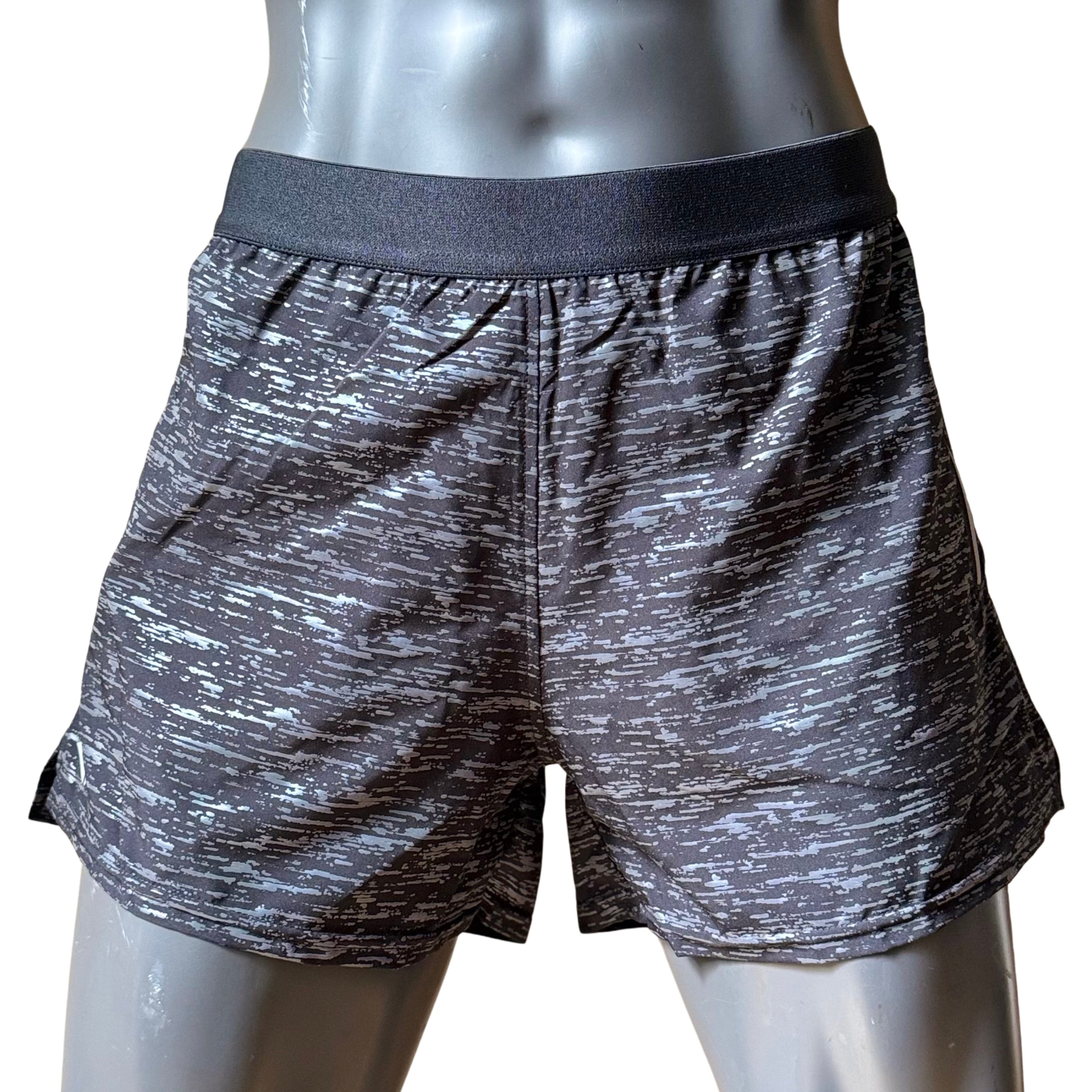 Short reflejante corto dama