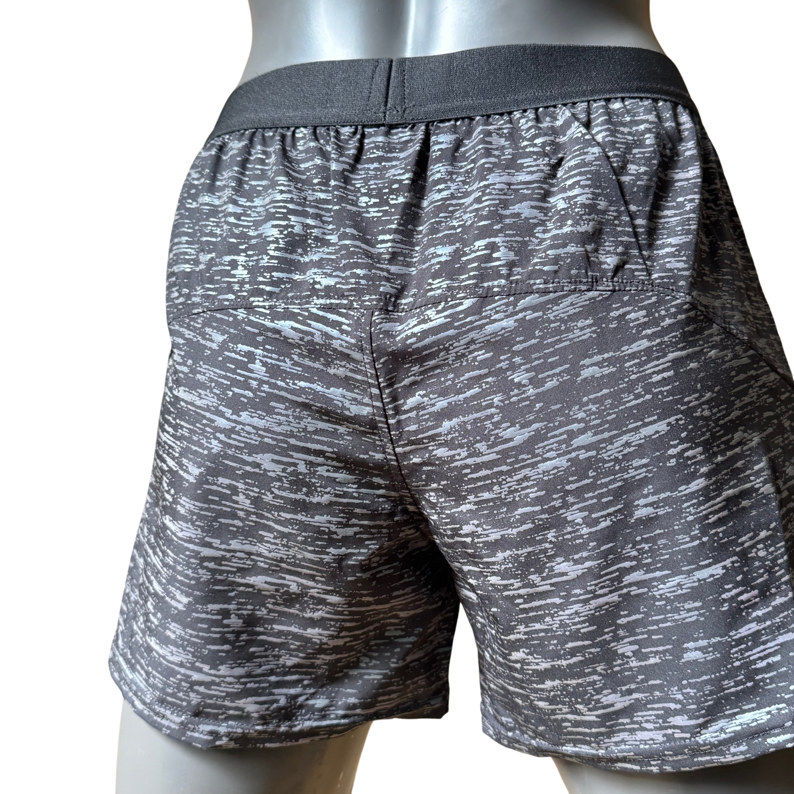 Short reflejante corto dama