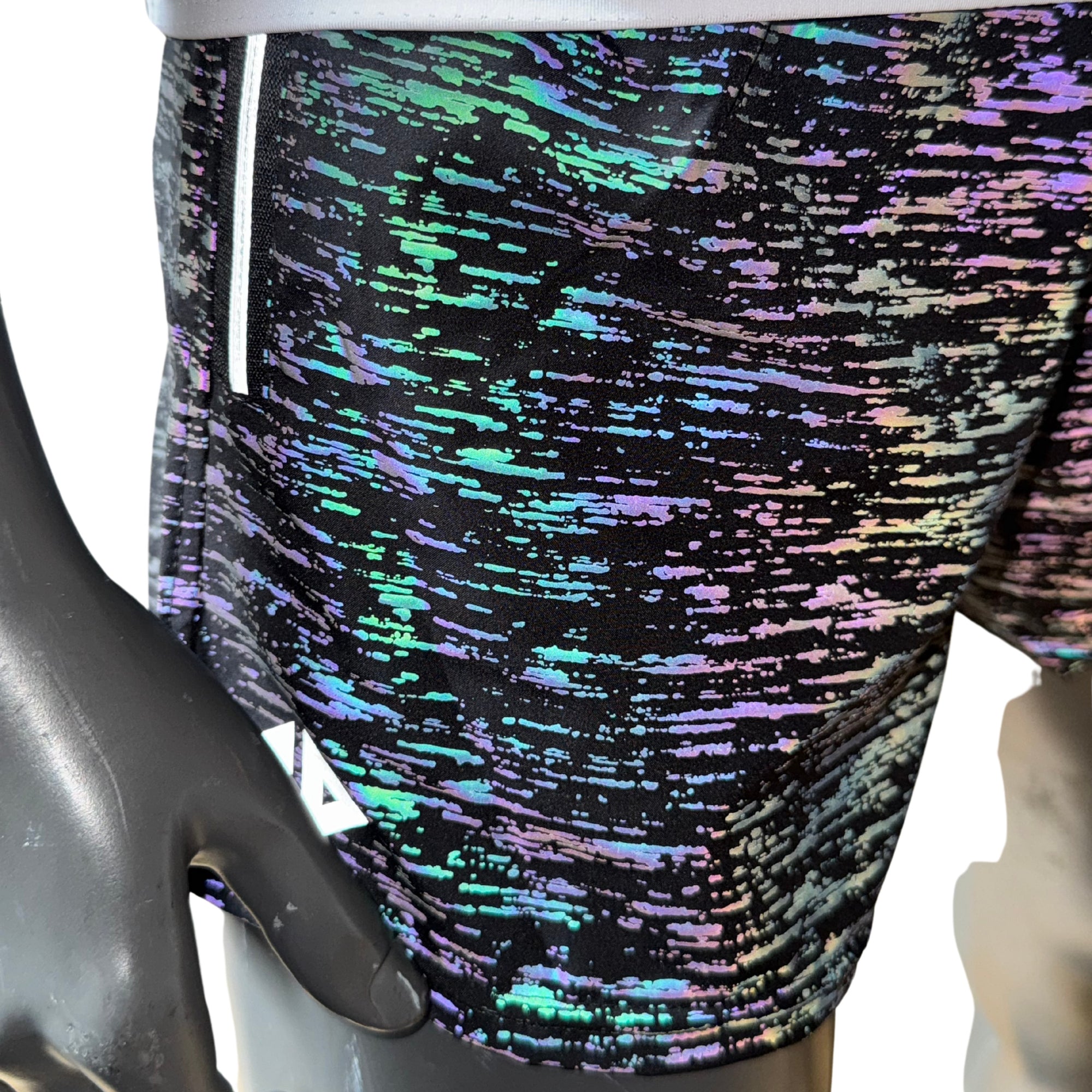 Short reflejante corto dama