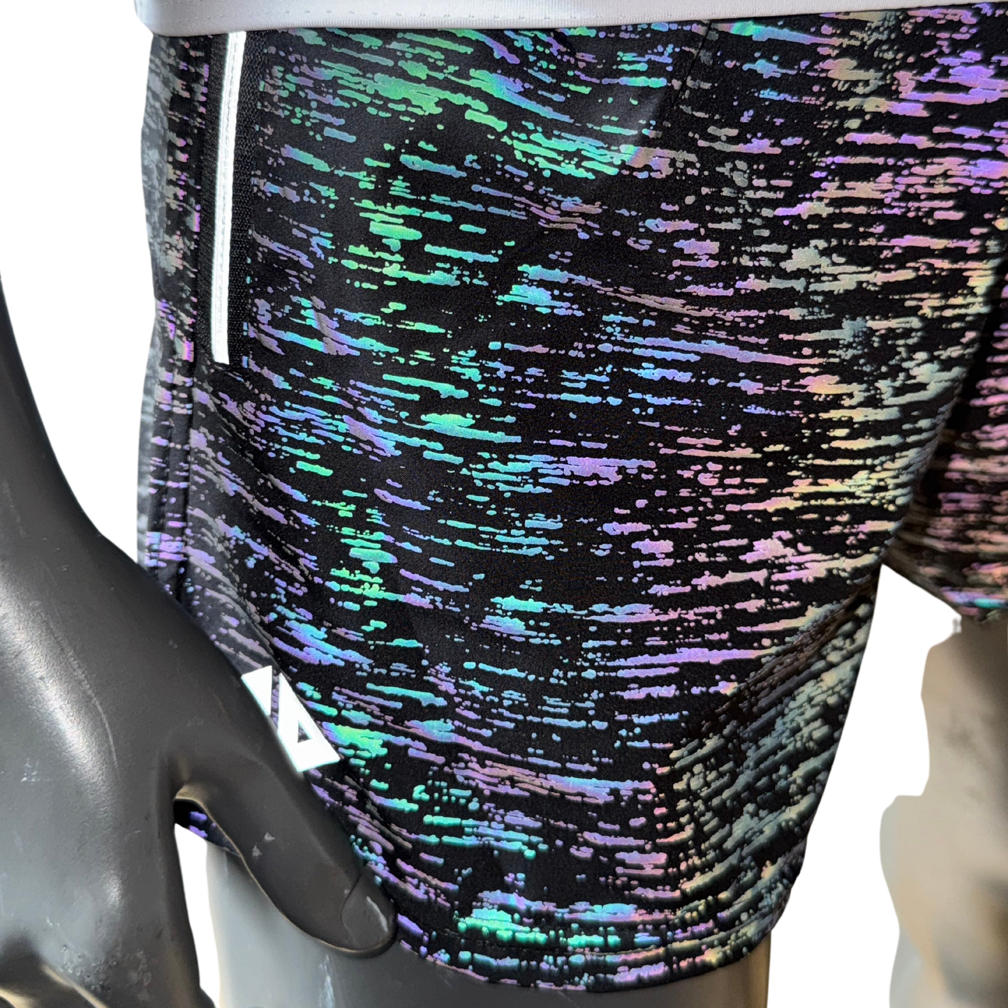 Short reflejante corto dama