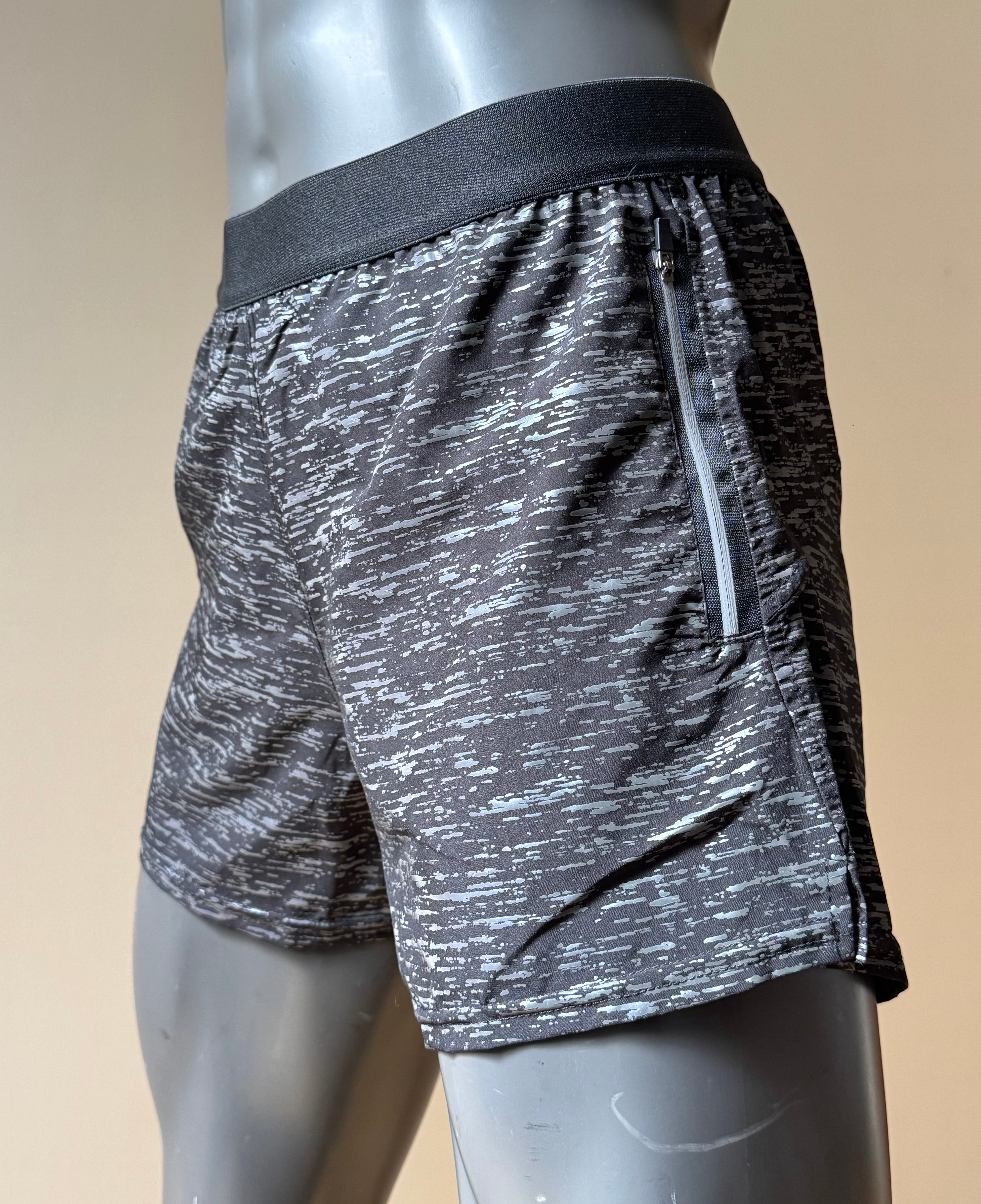 Short reflejante corto caballero